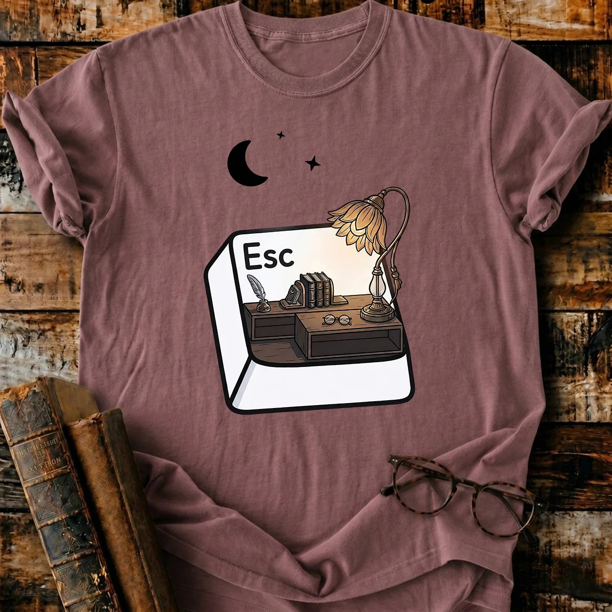 Garment-dyed Comfort Colors Escape T-Shirt in brown, featuring a desk scene inside an "Esc" key.